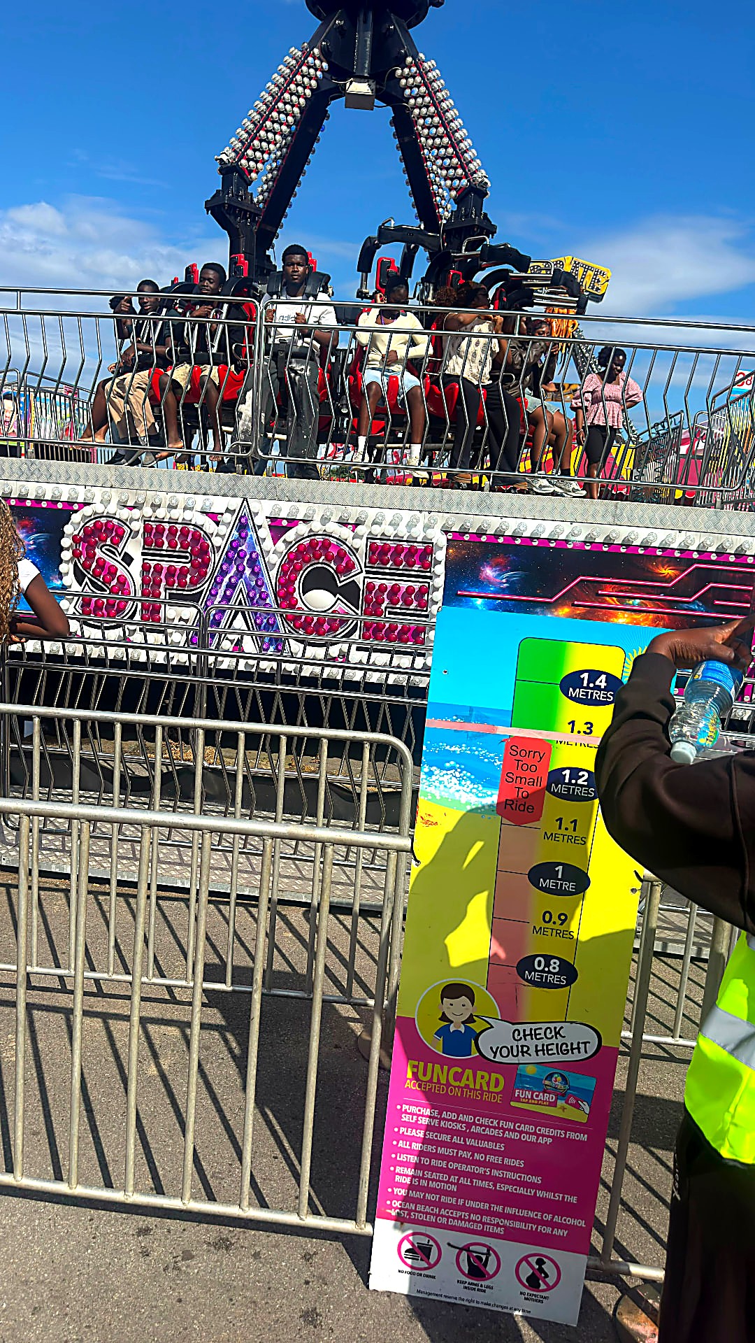Young people take on one of the park's thrill rides.